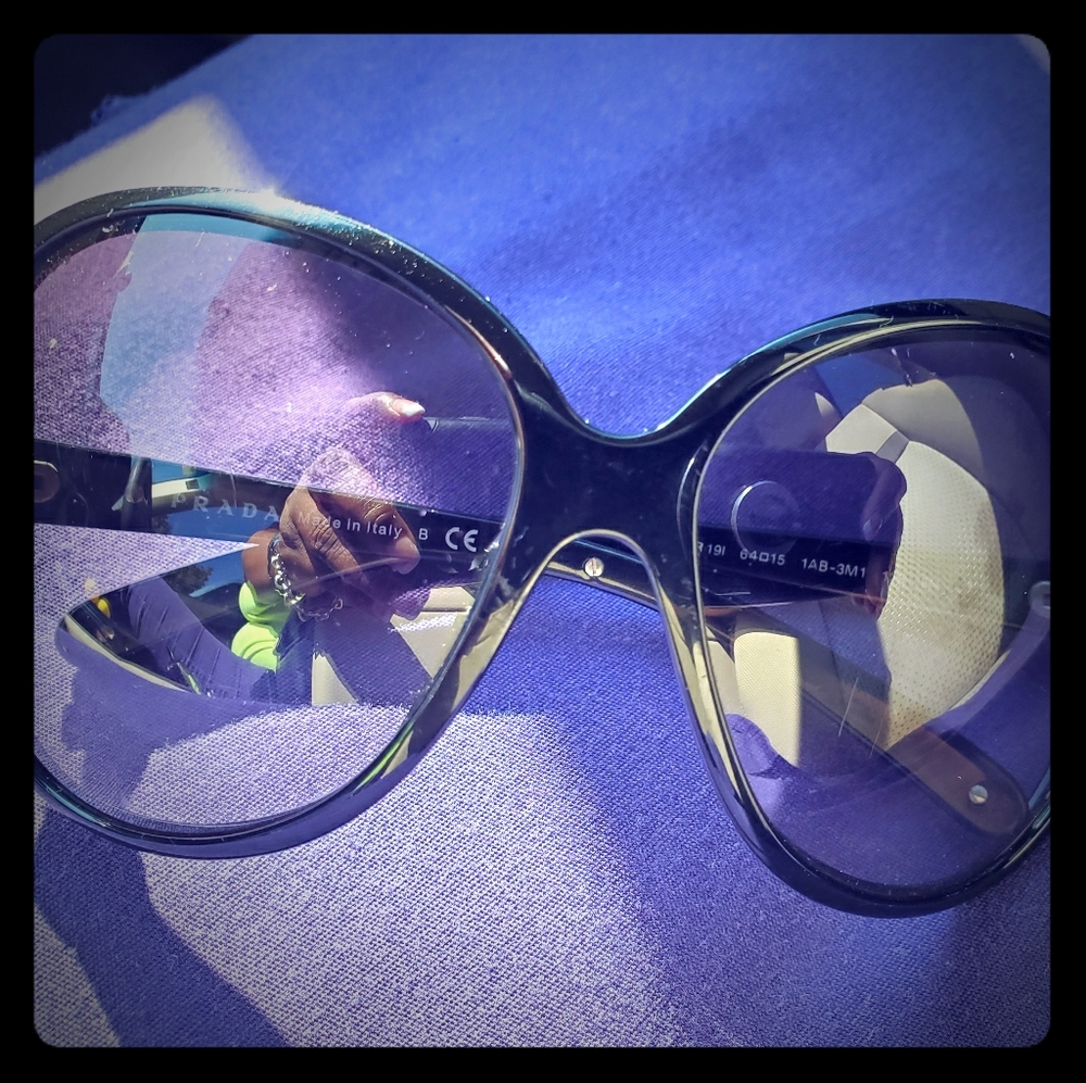 Authentic - Prada sunglasses.